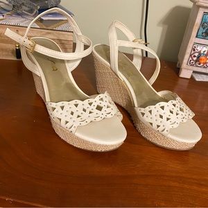 Off white colored Wedge high heels
